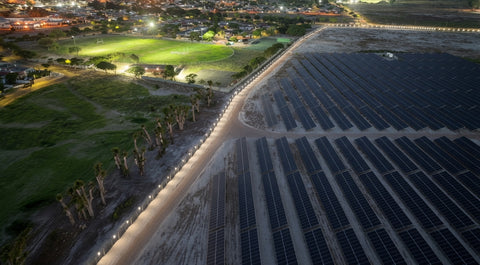 Solar farm perimeter lighting that installs on the fence, not in the ground
